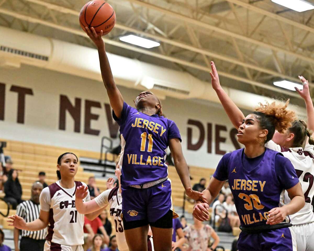 Jersey Village guard Ja'Nya Thomas (11) sinks a layup for two of her game-high 24 points in the Lady Falcons' victory over Cy Fair on Tuesday night. 