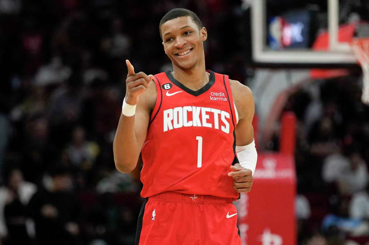 Houston Rockets forward Jabari Smith Jr. reacts after making a 3-point basket during the first half of an NBA basketball game against the Phoenix Suns, Tuesday, Dec. 13, 2022, in Houston. (AP Photo/Eric Christian Smith)
