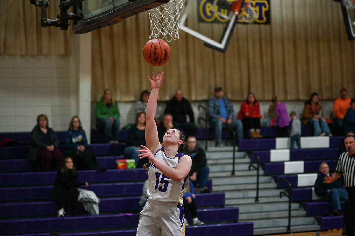 Calvary Baptist's Caitlyn Dickerson drives to the rim during a Dec. 13, 2022 game against North Huron. Dickerson scored 22 points twice in a pair of losses over the weekend.
