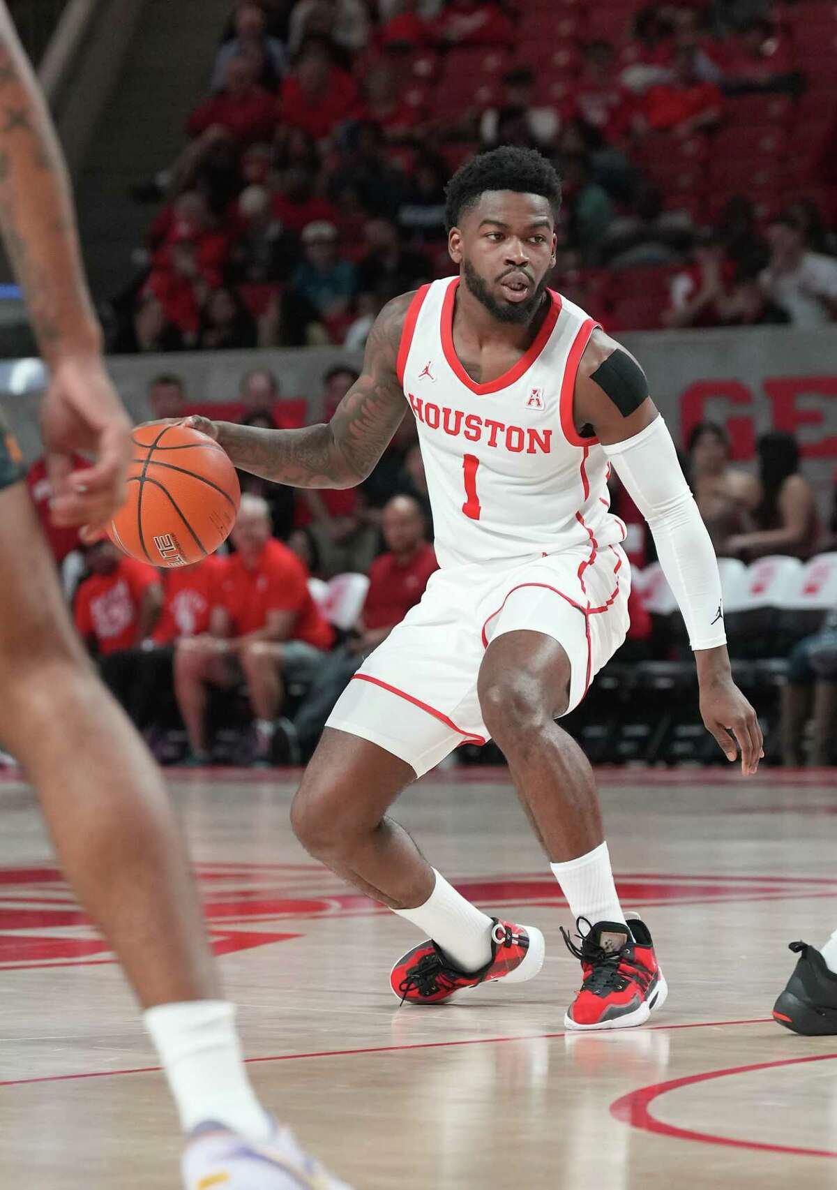 Houston Cougars guard Jamal Shead (1) drives the ball across court against North Carolina A&T Aggies in the second half at the Fertitta Center on Tuesday, Dec. 13, 2022 in Houston. Houston Cougars won the game 74-46.