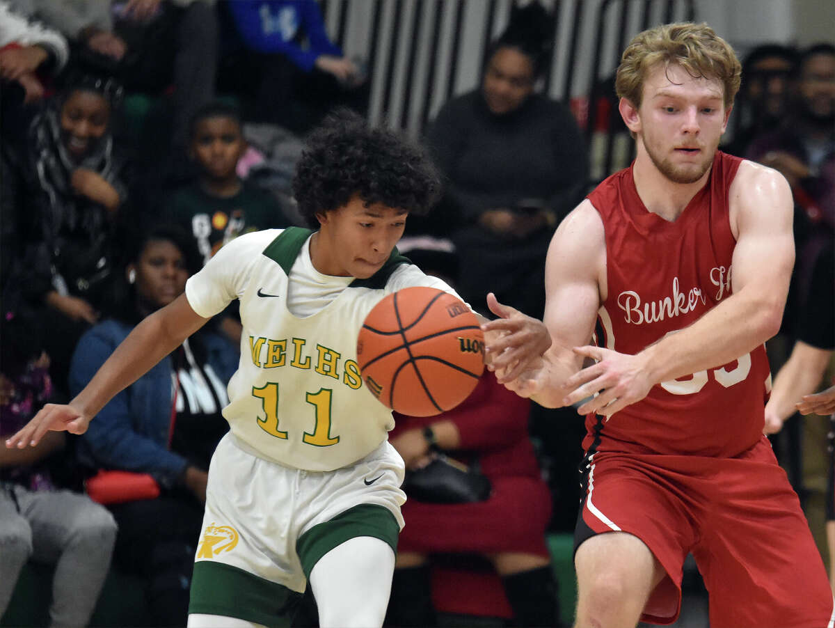 Metro-East Lutheran's Thijson Heard steals the ball from Bunker Hill's Daniel Manar in the second half on Tuesday in Gateway Metro Conference action in Edwardsville.