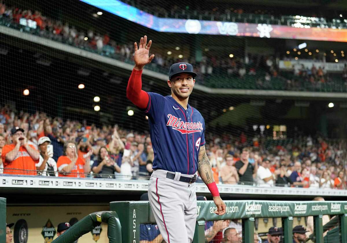 Carlos Correa waves to the crowd before the start of an MLB baseball game at Minute Maid Park on Tuesday, Aug. 23, 2022 in Houston.