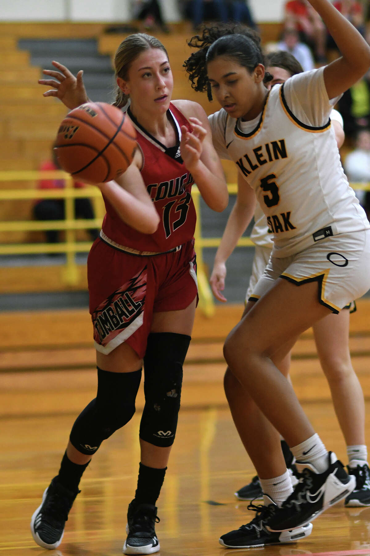 High school basketball Tomball girls hold off Klein Oak