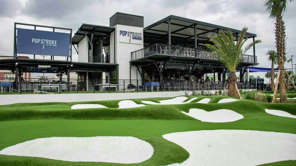 Putt-putt golf course and entertainment center by Tiger Woods prepares to open its doors on Tuesday, Dec. 13, 2022, at Pop Stroke in Katy.