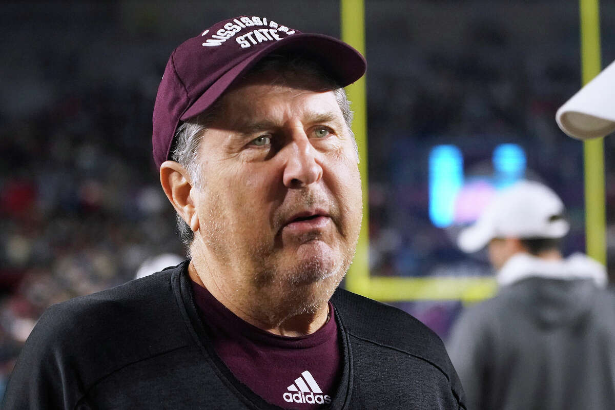 Mississippi State football coach Mike Leach died late Monday. He is shown at the Nov. 24 game against Ole Miss in Oxford, Miss. talks w. Solis)