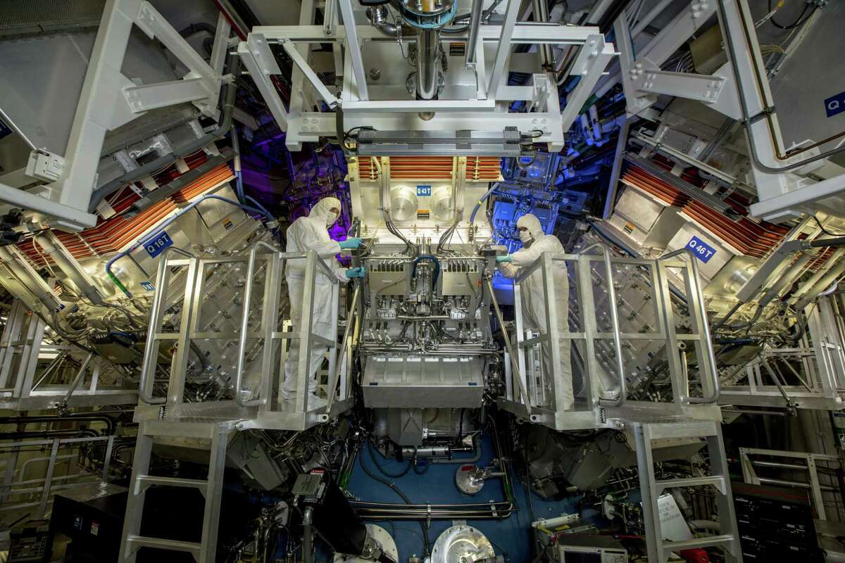 A government photo shows technicians inspecting a final optics assembly during routine maintenance on the National Ignition Facility of the Lawrence Livermore National Laboratory in California in June 2018. Scientists studying fusion energy at the laboratory announced on Tuesday, Dec. 13, 2022, that they had crossed a long-awaited milestone in reproducing the power of the sun in a laboratory. (Jason Laurea/Lawrence Livermore National Laboratory via The New York Times) ?‘ NO SALES; EDITORIAL USE ONLY?‘