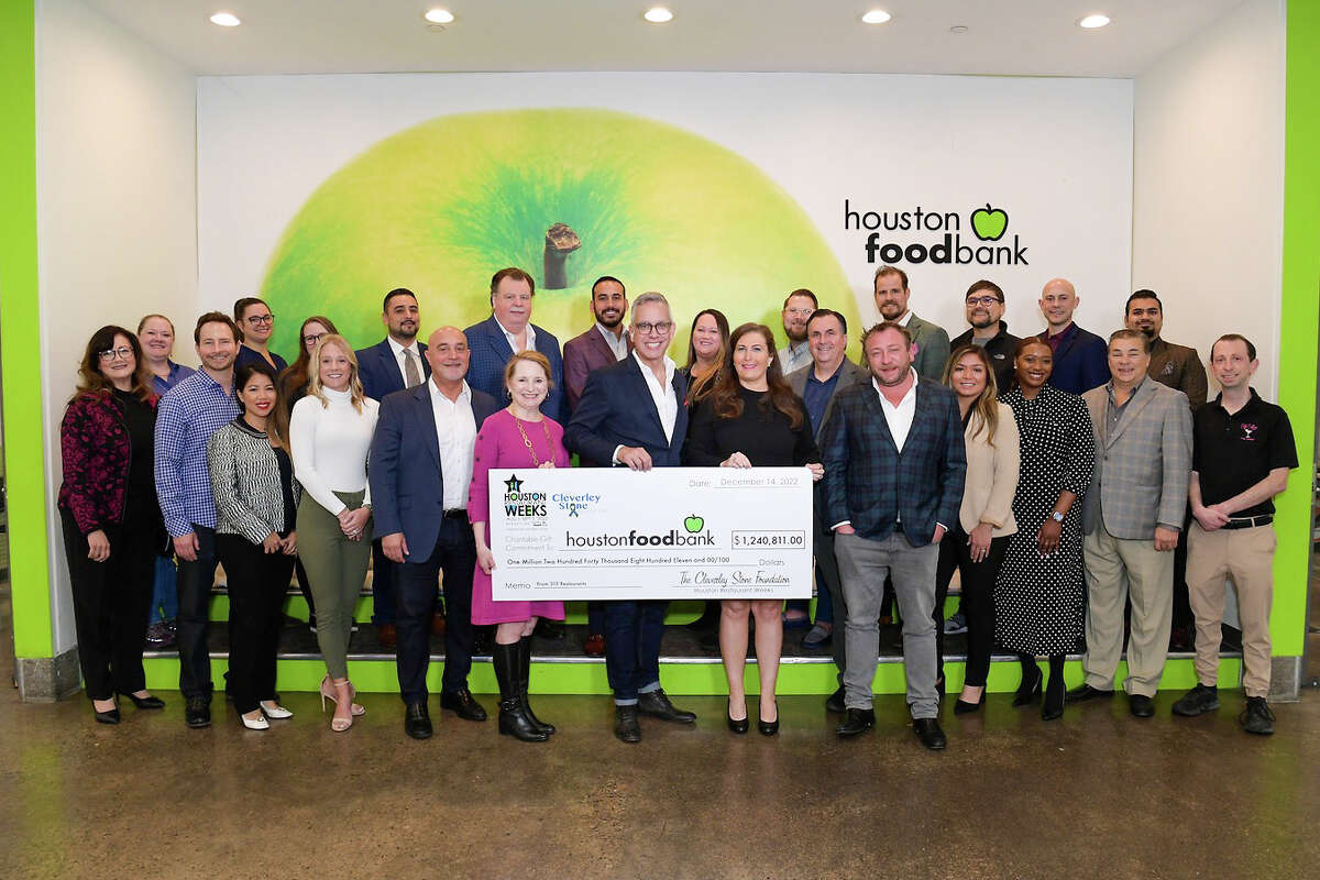Houston Restaurant Weeks presented a check for $1,240,811 to the Houston Food Bank, the recipient of donations from the citywide dining event for 2022.