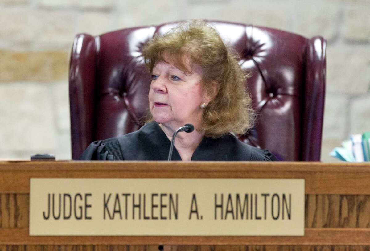 Montgomery County commissioners have changed pay for court interpreters following a miscommunication when the fees were set in November. The court amended its Nov. 8 action and agreed to pay interpreters a flat rate of $650 per day for more than four hours of services. 359th state District Court Judge Kathleen Hamilton is shown in her courtroom.  