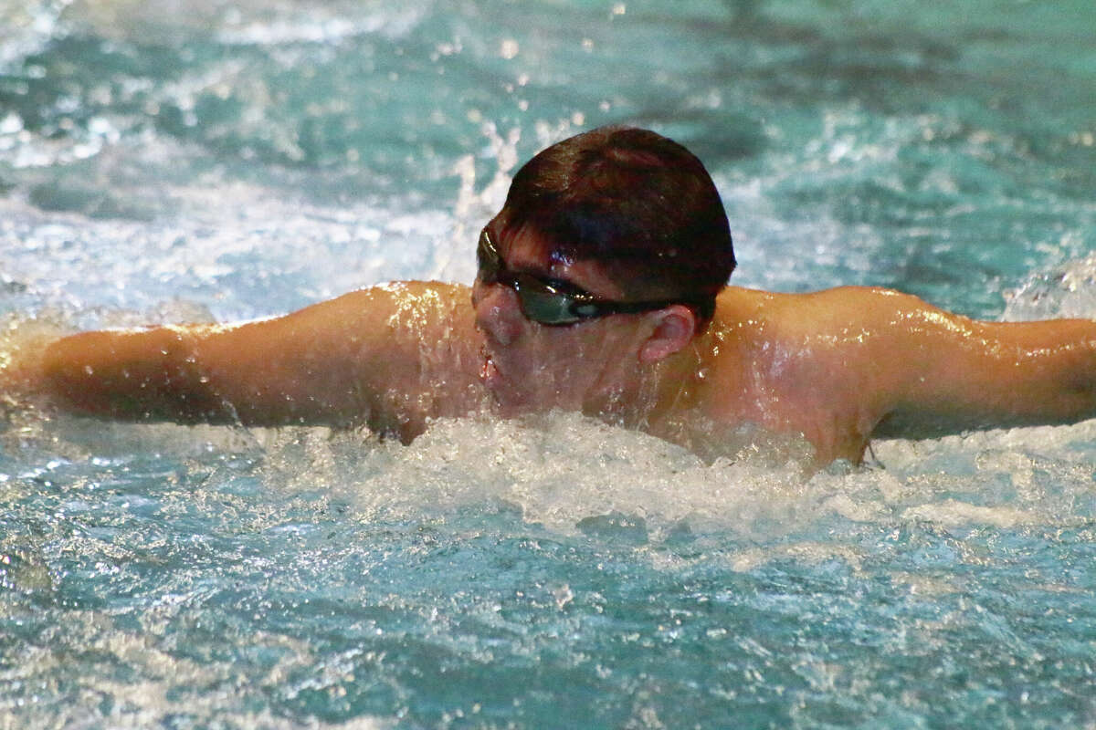 Austin Norcio practices at SIUE ahead of the Edwardsville swim season. 