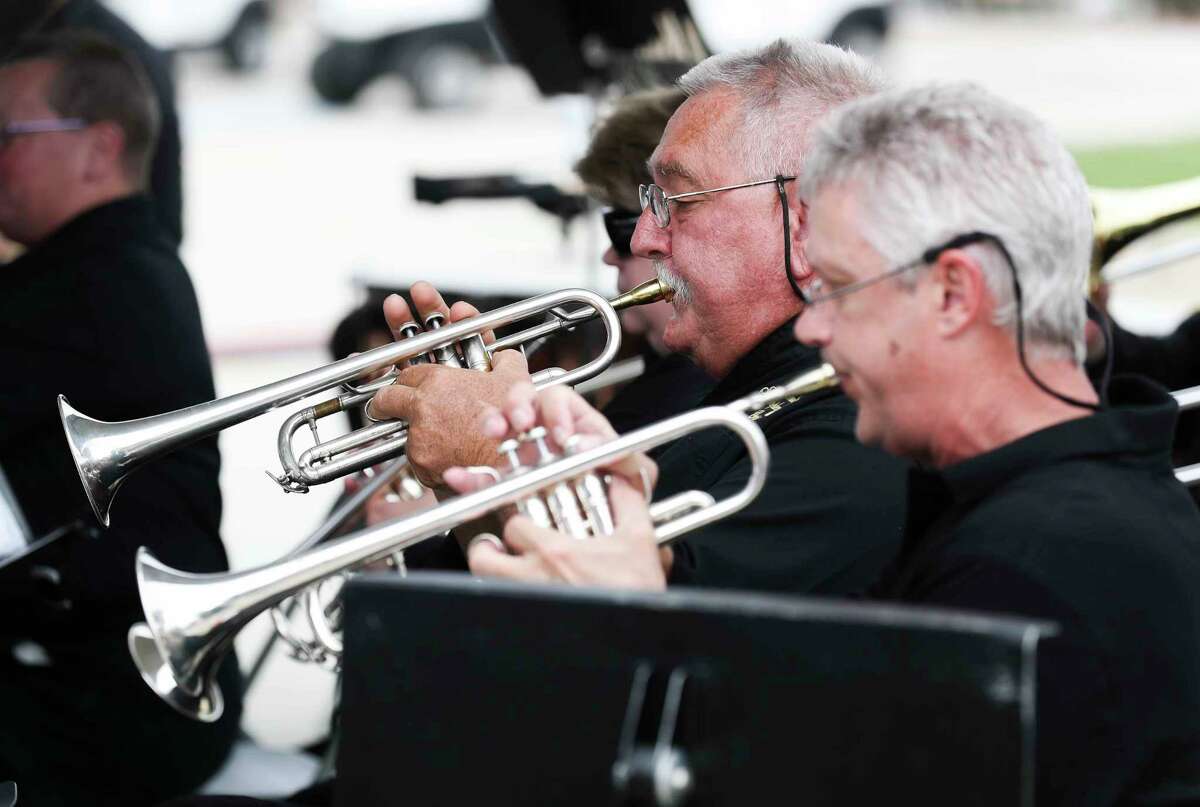 Members of the Conroe Symphony Orchestra perform during a ceremony in honor of Veterans Day at the Montgomery County Veterans Memorial Park, Friday, Nov. 11, 2022, in Conroe.