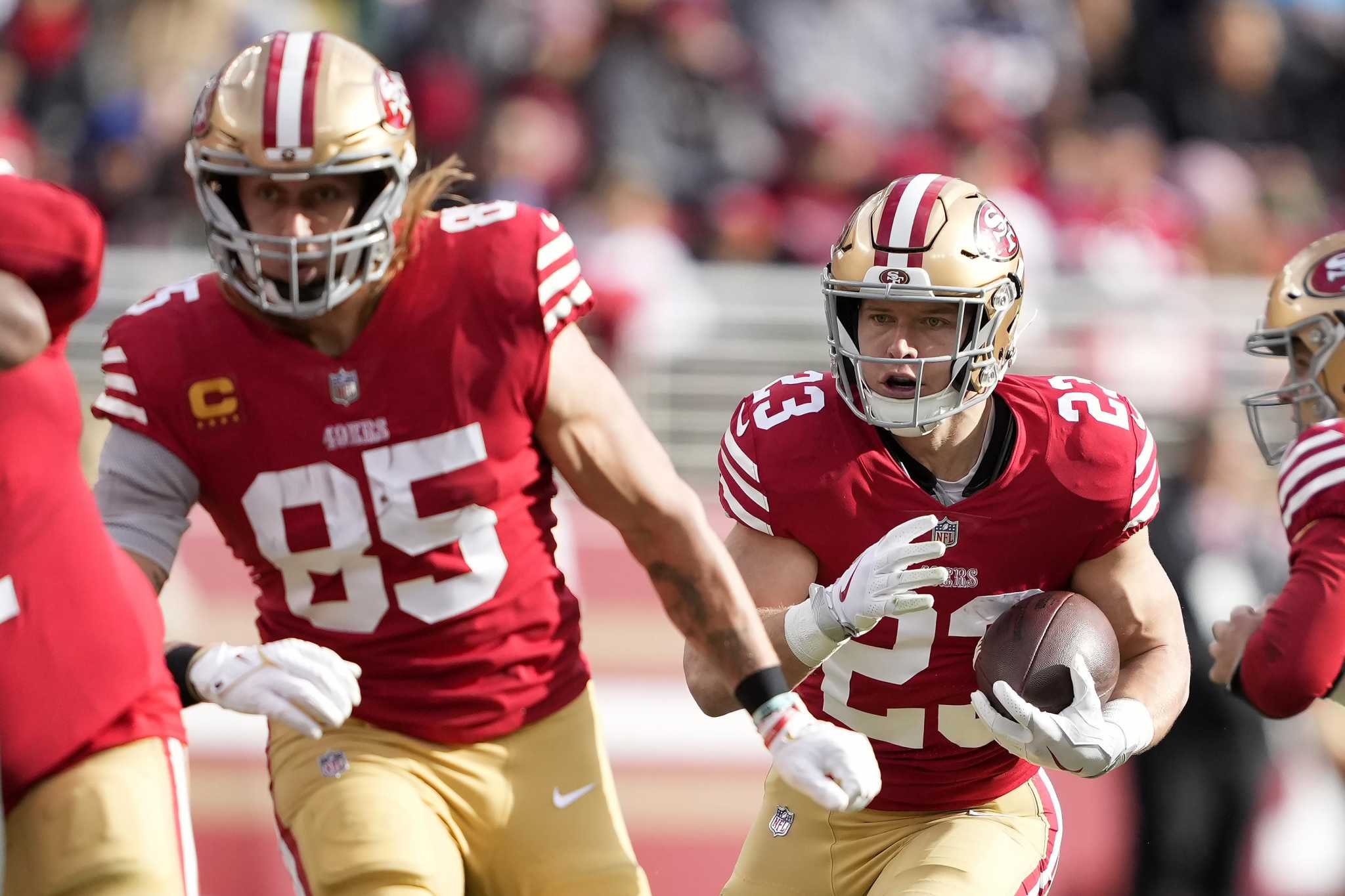 Dec 11, 2022; Santa Clara, California, USA; San Francisco 49ers running  back Christian McCaffrey (23) runs with the football during the third  quarter against the Tampa Bay Buccaneers at Levi's Stadium. Mandatory