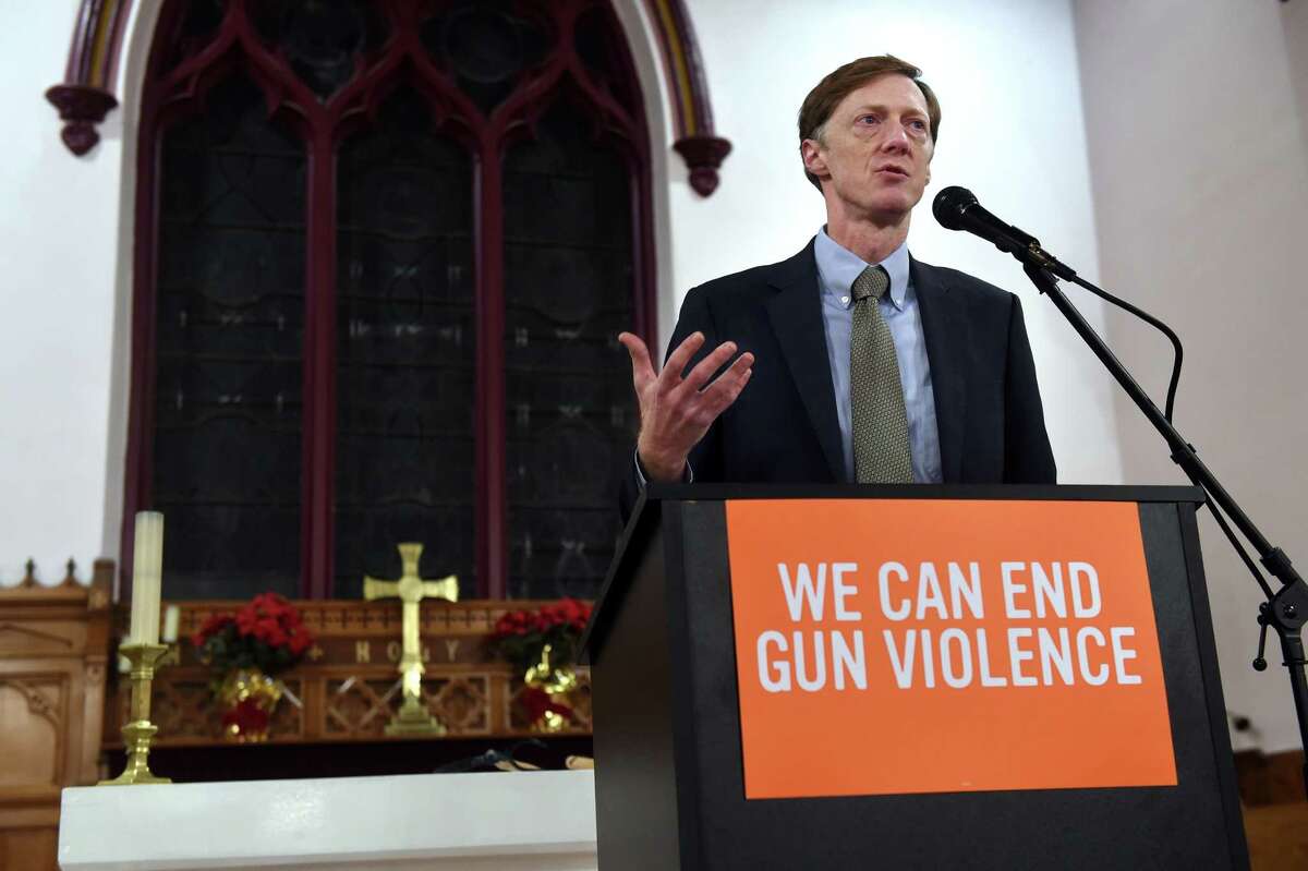 New Haven Mayor Justin Elicker speaks at St. James Episcopal Church in New Haven Wednesday at an event remembering the victims of the Sandy Hook Elementary School shootings and all gun violence victims and survivors in the state.
