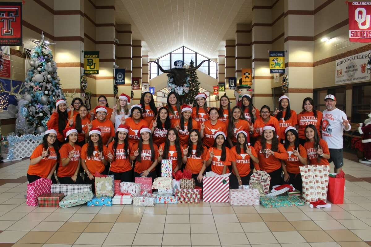 The United softball team donated Christmas presents to Child Protective Services for the 12th straight year.