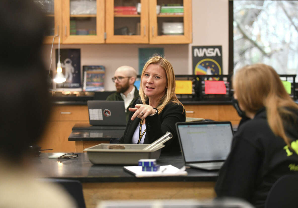 Assistant Principal Suzanne Coyne chats with fellow educators during a meeting at Western Middle School in Greenwich, Conn. Thursday, Dec. 15, 2022. Coyne was recently named the Connecticut Association of Schools Middle School Assistant Principal of the Year.