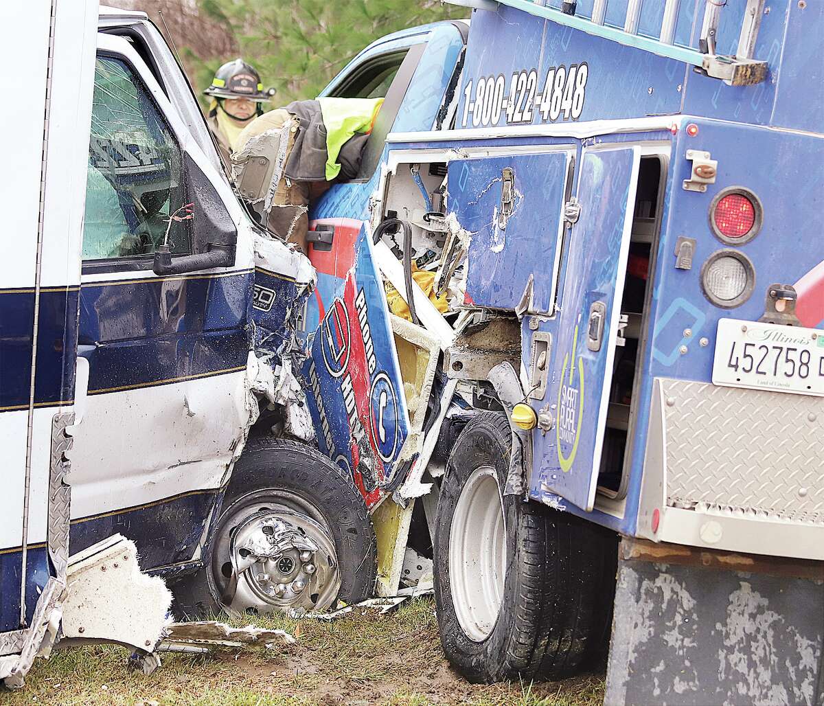 John Badman|The Telegraph Both a Bunker Hill Area Ambulance Service rig and a work truck were extensively damaged in a Thursday morning crash.