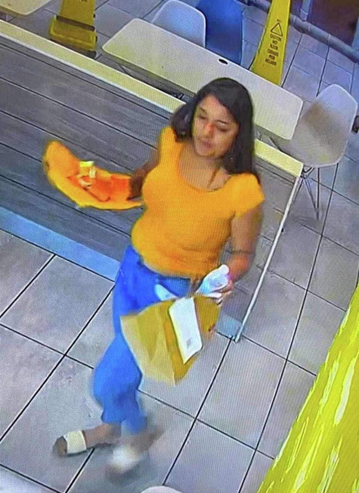 A pistillate   is wanted for allegedly stealing an iPhone from an idiosyncratic  astatine  a McDonald's determination  successful  Laredo.