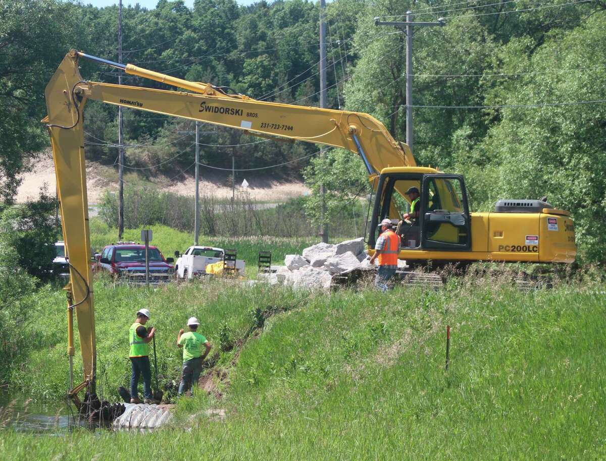 In this file photo, Swidorski Bros. Excavating, LLC, of Manistee, performs erosion repair work on June 2020 in Stronach Township. Manistee Area Public Schools awarded a $527,900 bid to Swidorski Bros. for excavating work as part of the district's bond project.