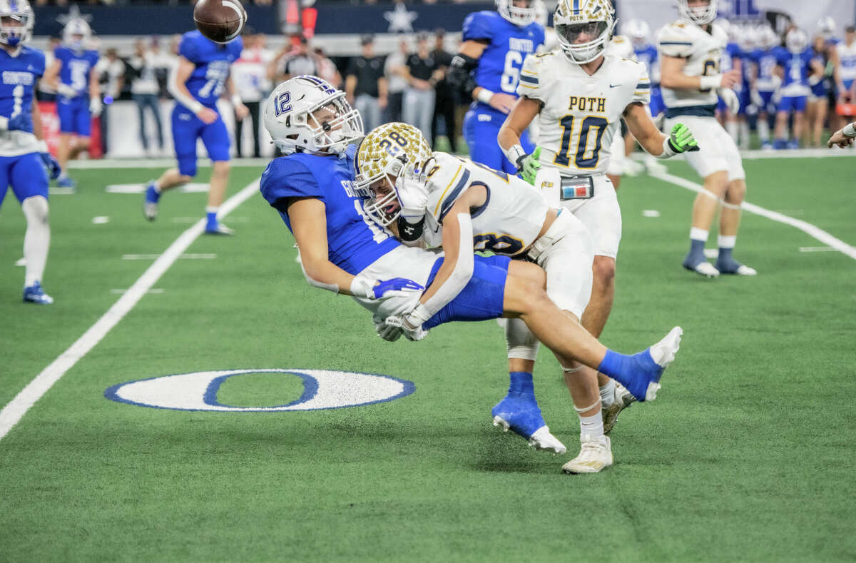 Poth defensive back Colin Ramzinkski delivers a big hit against Gunter's Ivy Hellman in the second quarter of the Class 3A Division II state championship game Thursday at AT&T Stadium in Arlington.