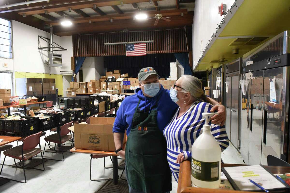 Sullivan County Federation for the Homeless cook Mike Steinback, left, stands with director Kathy Kreiter, right, on Monday, Dec. 12, 2022, at Sullivan County Federation for the Homeless where Robert Hoagland would volunteer in the kitchen over the holidays in Monticello, N.Y.