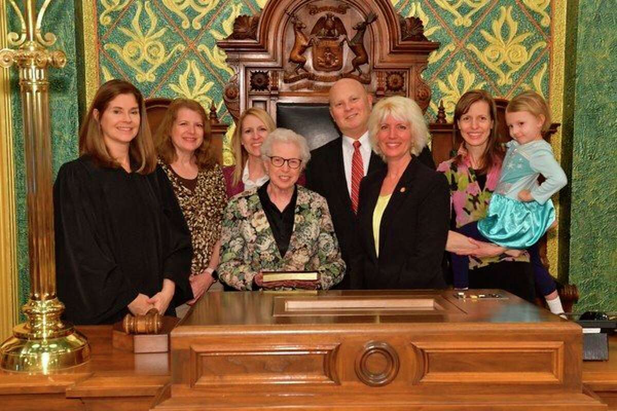 State Rep. Annette Glenn is sworn into office in January 2019 at the state Capitol to begin her first term as state representative. Justice Bridget McCormack of the Michigan Supreme Court performed the swearing in ceremony on the House floor. Pictured from left to right: Justice McCormack, LuAnn Hodson, Karann Chew, Betty Williams, husband Gary Glenn, Rep. Annette Glenn, Carolyn Whitmore and Kaylee Whitmore.  