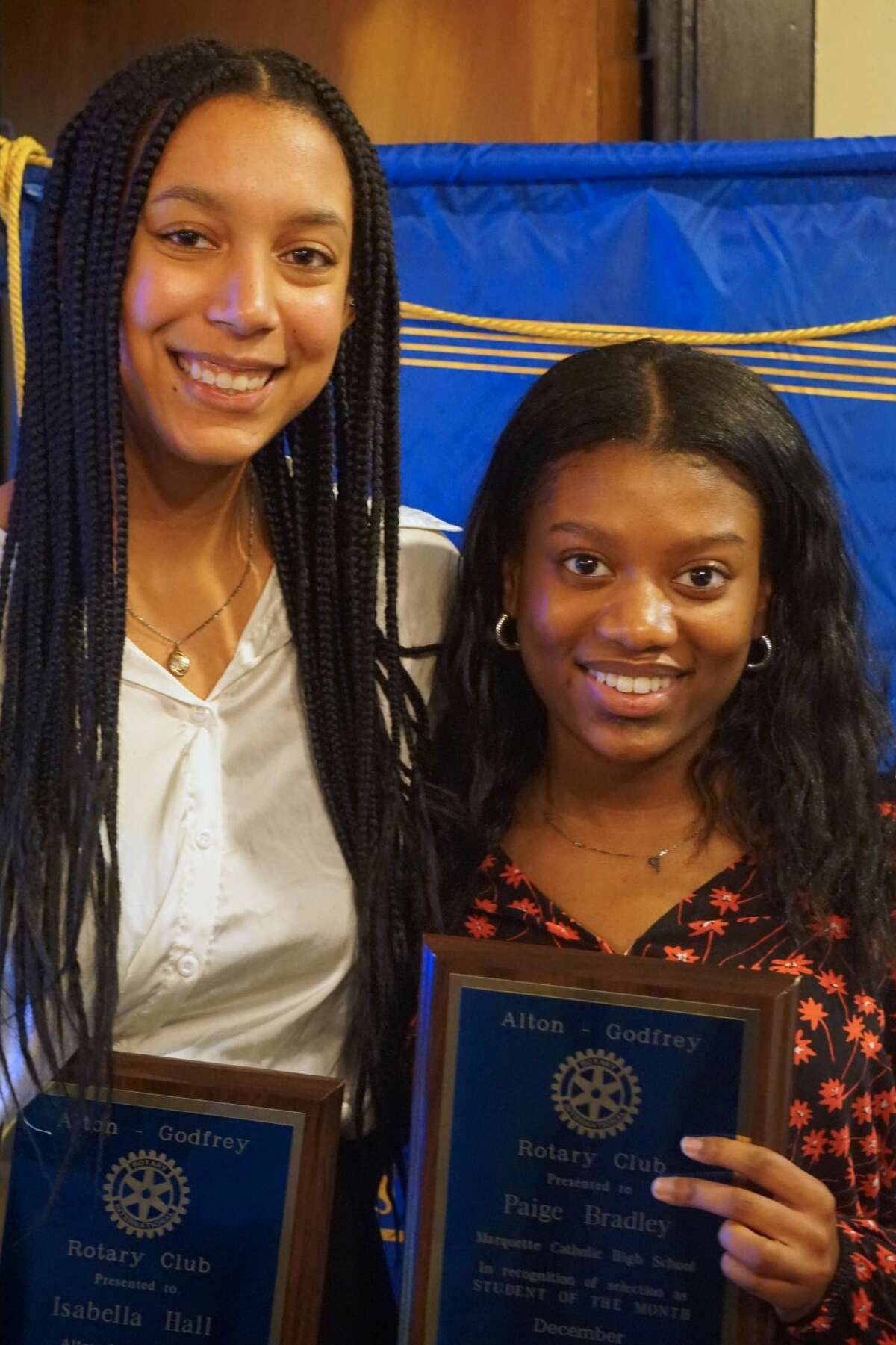 Isabella Hall of Alton High School, left, and Paige Bradley of Marquette Catholic High School have been named Students of the Month for December by the Alton-Godfrey Rotary Club.