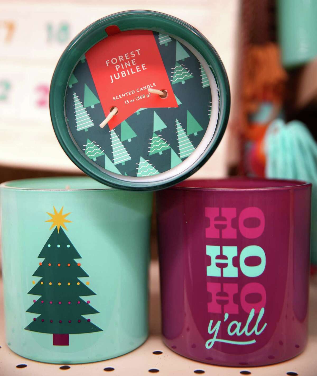 Scented candles with seasonal greetings available at HEB.