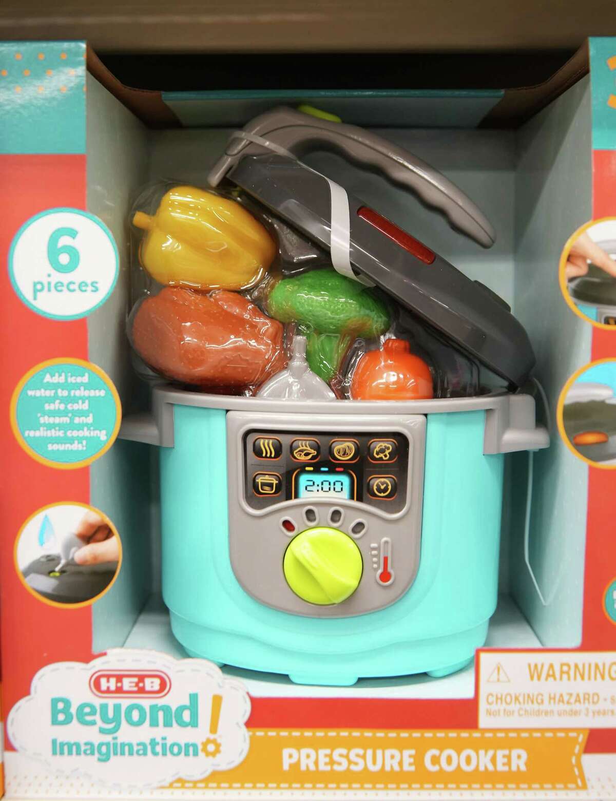 A variety of kitchen and household-goods themed toys, including a pressure cooker, are available in the seasonal aisle.