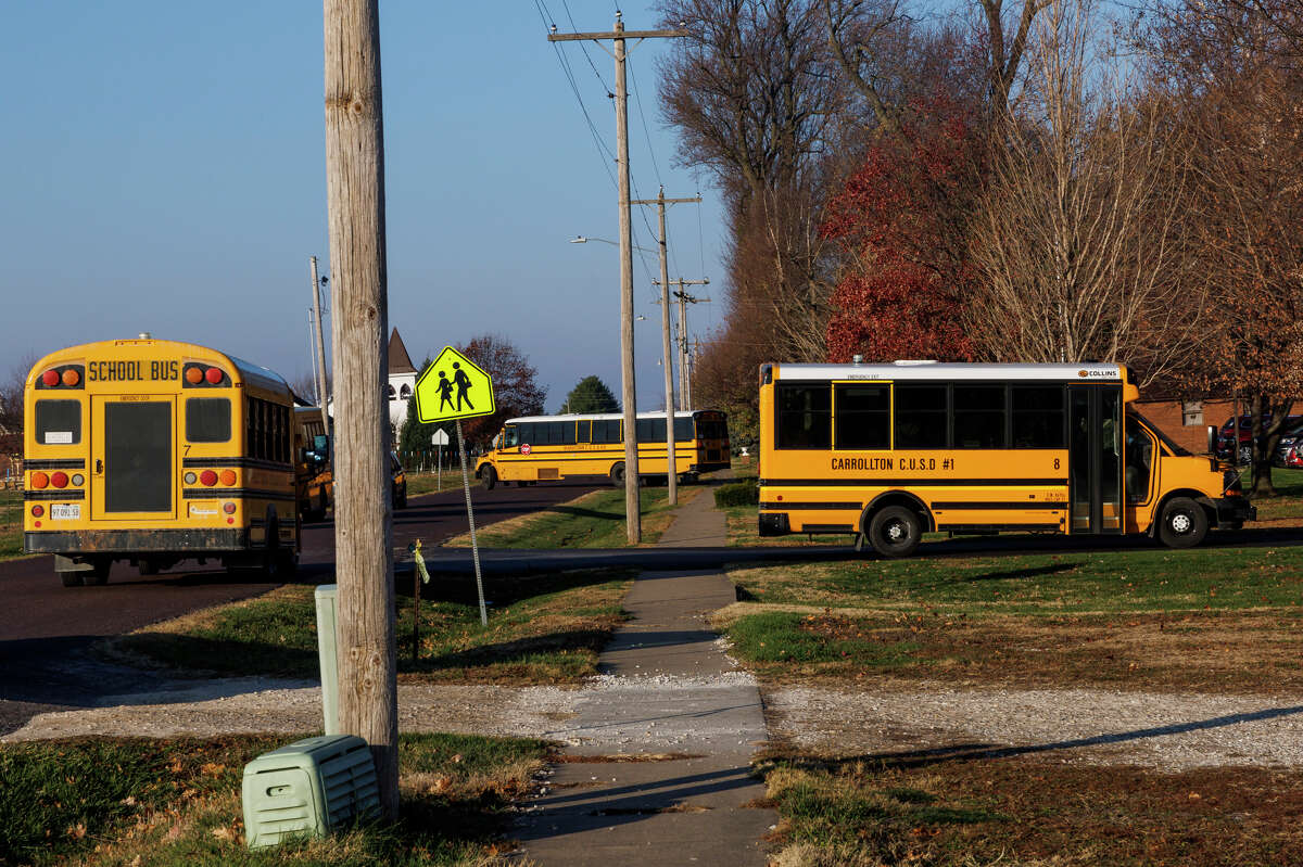 School buses arrive Nov. 16 at Garrison School. Jacksonville Police Chief Adam Mefford and Tracey Fair, director of Four Rivers Special Education District, say changes made in the past several years have reduced the number of arrests at the Jacksonville school by about half.