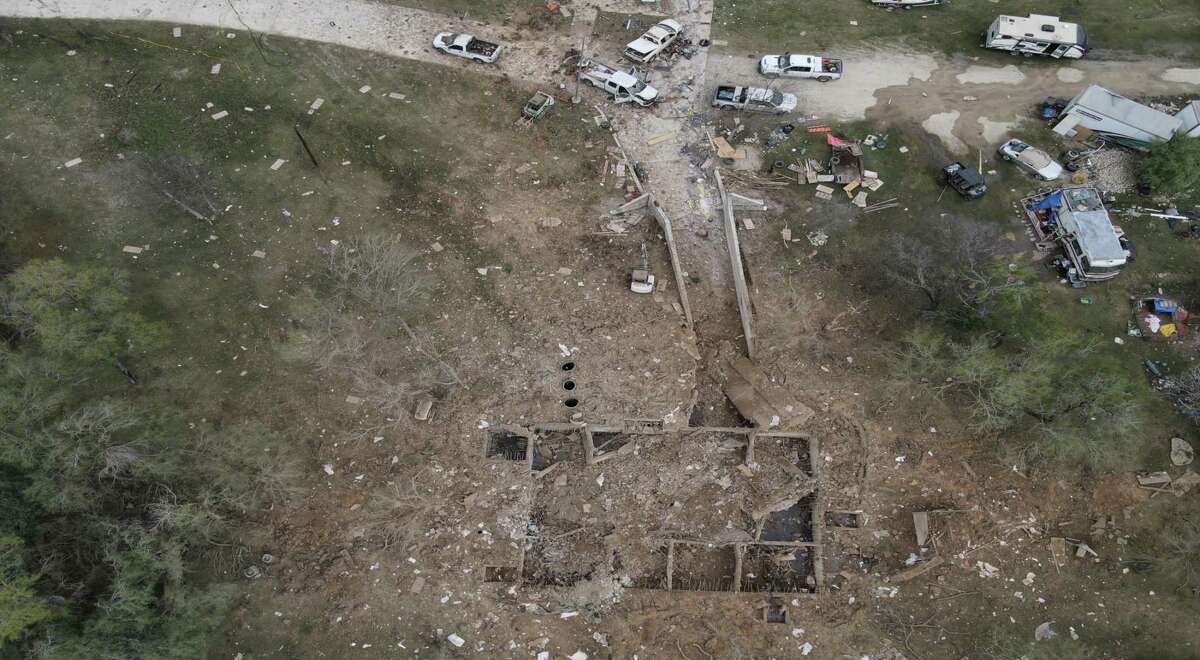 An aerial image shows the outline of the underground home where an explosion killed four people on Dec. 10. The property on which the home was built is co-owned by James Kalisek, 61, one of the people who died; and his brother Brian Kalisek, 57. The younger brother is a co-owner of K-Bar Services Inc., a construction company that operated on the property. An investigation into the cause of the explosion is ongoing.
