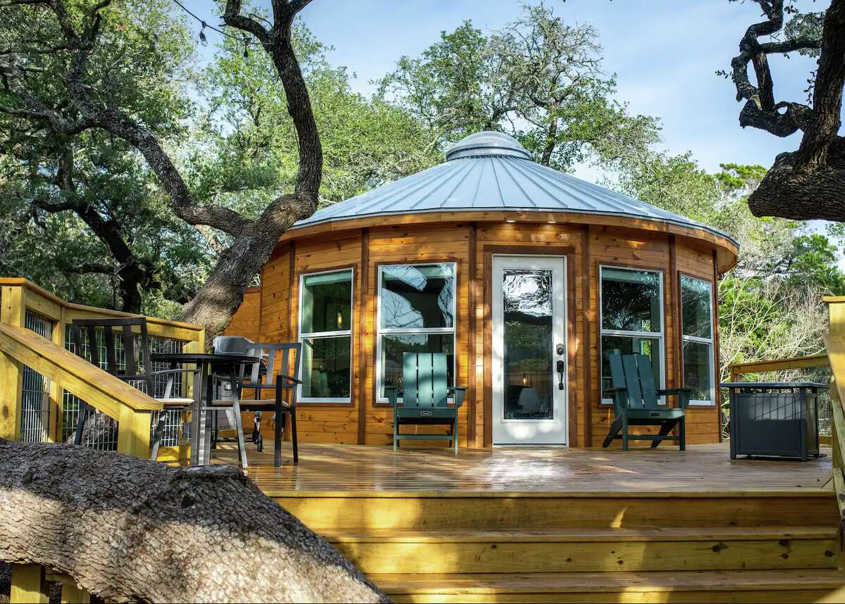 The treehouse yurt features a 300-square-foot-deck built into a 300-year-old live oak.