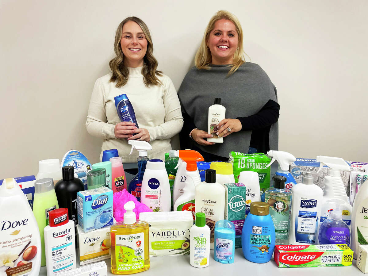 From left, Melissa George, program manager and Jennifer Wenderoth-Holster, executive director, with some of the donated items collected for the Women & Family Life Center's toiletry and household items drive.
