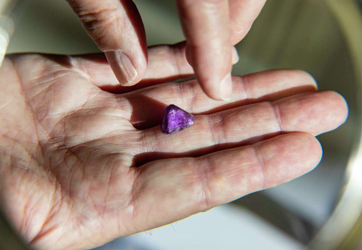 12/16/22 Houston, TX: USA: Kevin Heath holds a crystal that was grown at the International Space Station . Kevin Heath who founded founded a company called Space Crystals. For $150,000, a customer's DNA is launched into space and grown into two crystals. These crystals return home; one is given to the customer and then the other is sent to the moon. Heath said “we believe the two DNA-infused space crystals we create for our clients have a spiritual – almost mystical – connection that will be shared through time and space. So, every night when you look up at the moon you will know – and feel – that a part of you is up there. We call it the Crystal Connection.’”