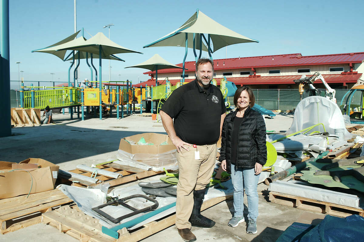 Pearland Parks and Recreation Department Assistant Director Kevin Carter and Kelly Moody, Forever Parks Foundation's past president, stand in the construction area for an inclusive playground being built at the Sports Complex at Shadow Creek..