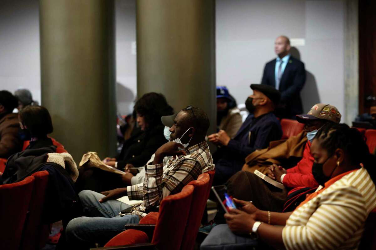 Audience members attend a California Reparations Task Force meeting Thursday at Oakland City Hall. The panel hosted two days of sessions to discuss a reparations plan it must finalize and submit to the Legislature by June 2023.