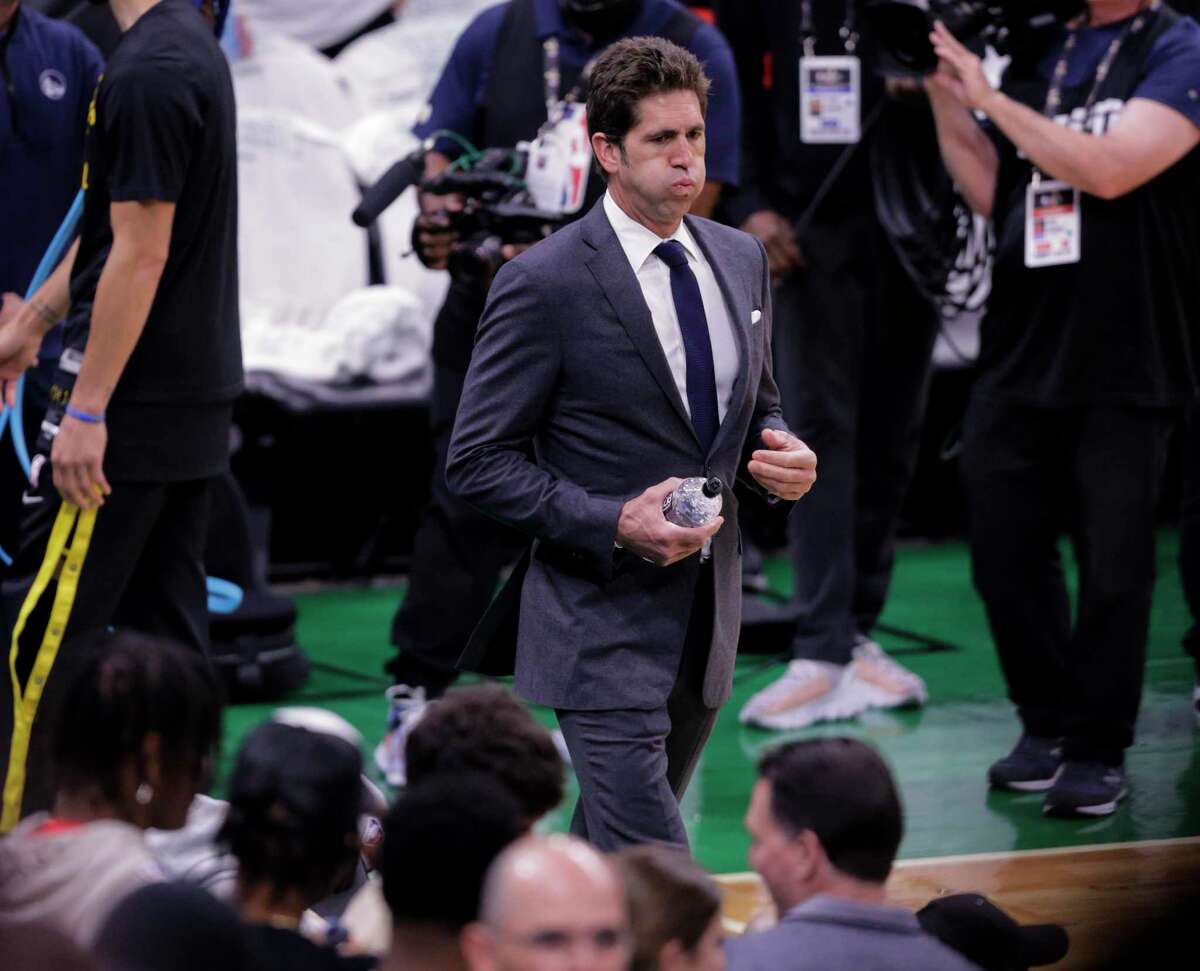 Bob Myers, President of Basketball Operations and General Manager of the Golden State Warriors walks to his seat before Game 4 of the NBA Finals between the Golden State Warriors and the Boston Celtics at TD Garden in Boston, Mass., on Friday, June 10, 2022.