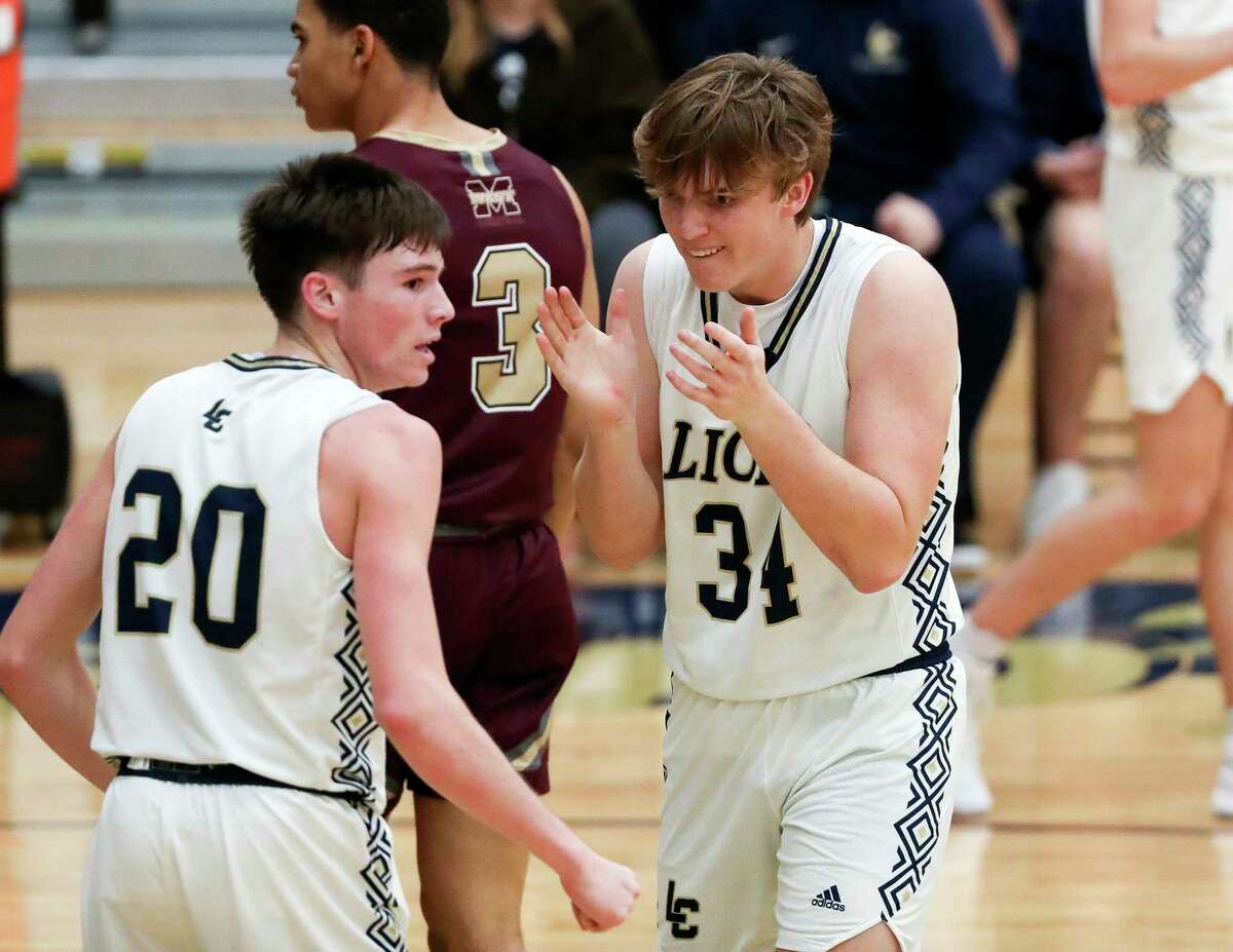 Lake Creek's Sawyer Matchett (34) reacts after Braedon Bigott (20) draws a foul in the fourth quarter of a District 21-5A high school basketball game at Lake Creek High School, Friday, Dec. 16, 2022, in Montgomery.