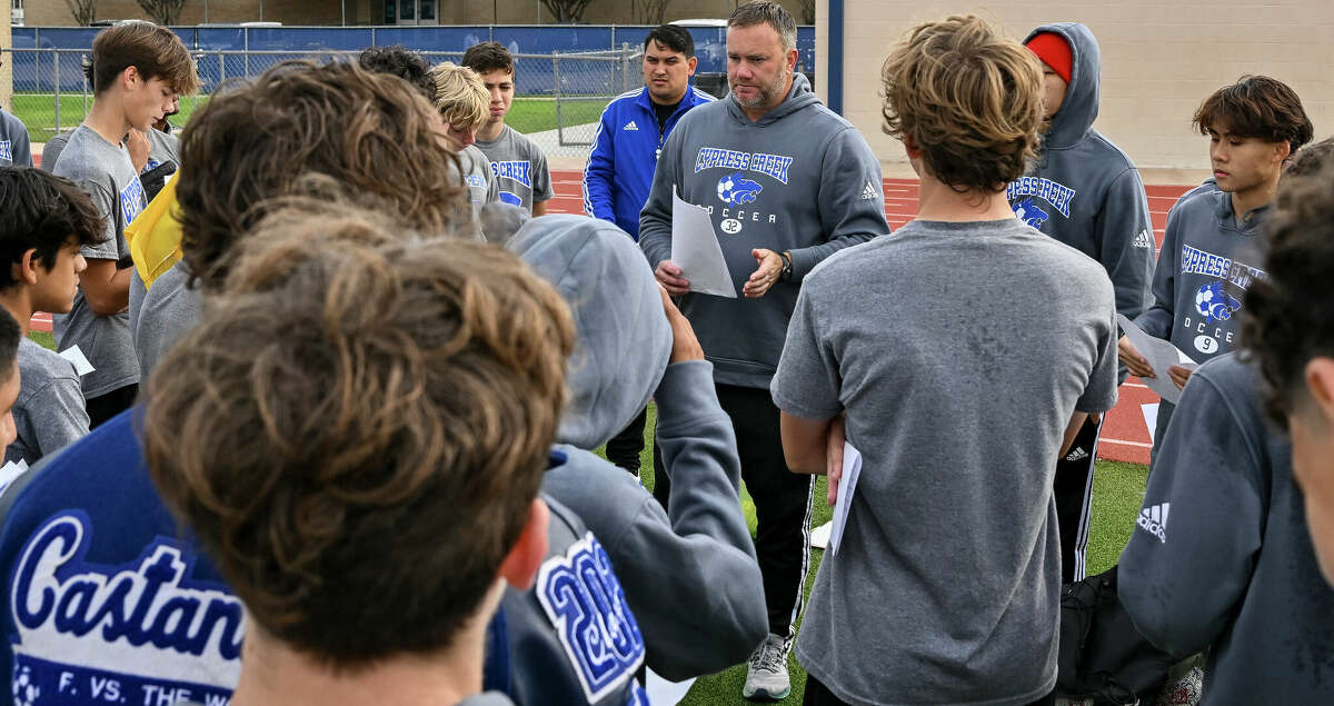 Cypress Creek head coach Josh O'Dear speaks with the team after practice at Cypress Creek High School in Houston, Texas on Friday, December 6, 2022.