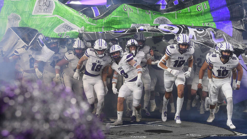 Port Neches-Groves emerges from the tunnel to face Dallas South Oak Cliff in the 5A-II state championship at AT&T Stadium. Photo made Friday, December 16, 2022 Kim Brent/Beaumont Enterprise