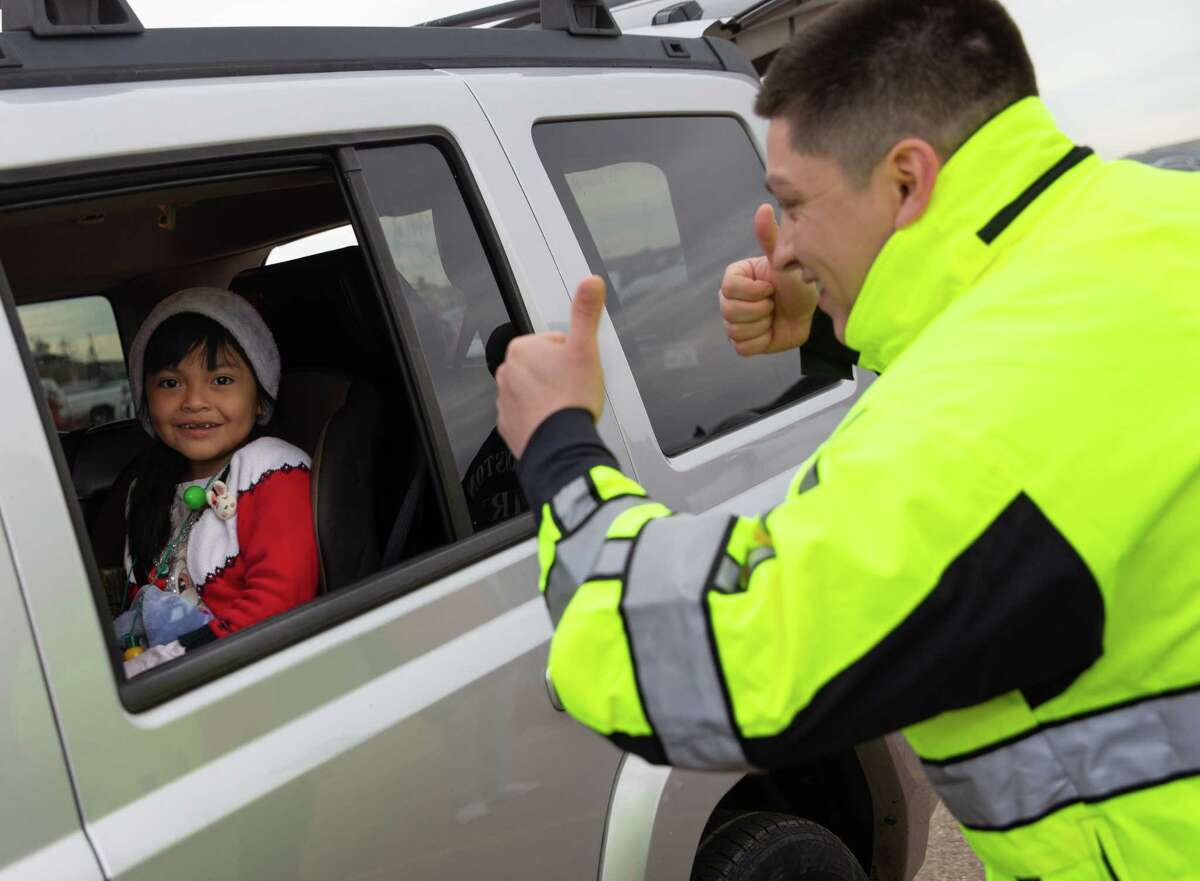 Houston Fire Department Toy Giveaway Sees Hundreds Of Cars Line Up