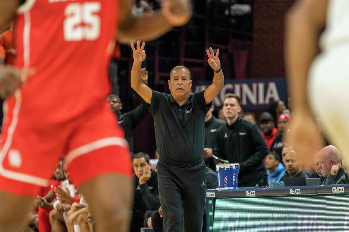 Houston head coach Kelvin Sampson directs his team during the first half of an NCAA college basketball game against Virginia in Charlottesville, Va., Saturday, Dec. 17, 2022.