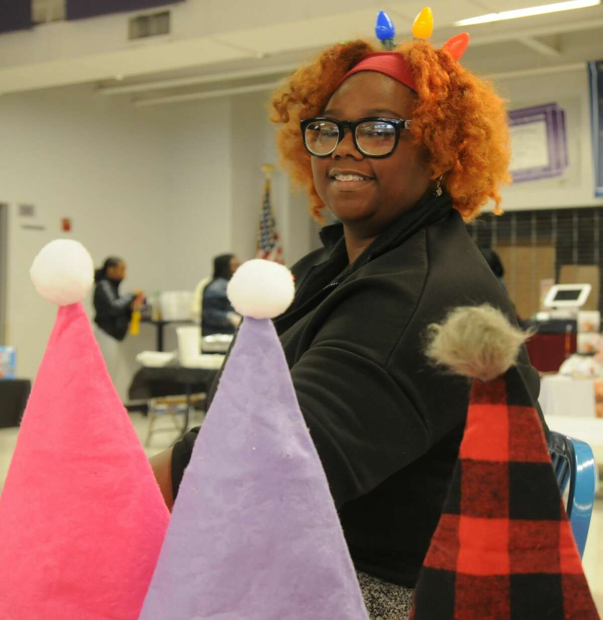 Brytnee' Jackson's face painting booth had holiday props during Saturday's Holiday Craft Fair at Collinsville High School.