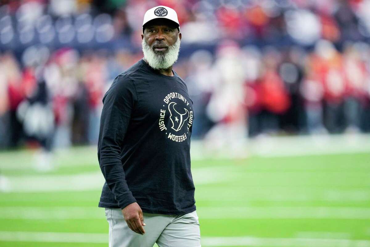 Houston Texans head coach Lovie Smith walks on the field before an NFL football game against the Kansas City Chiefs Sunday, Dec. 18, 2022, in Houston.