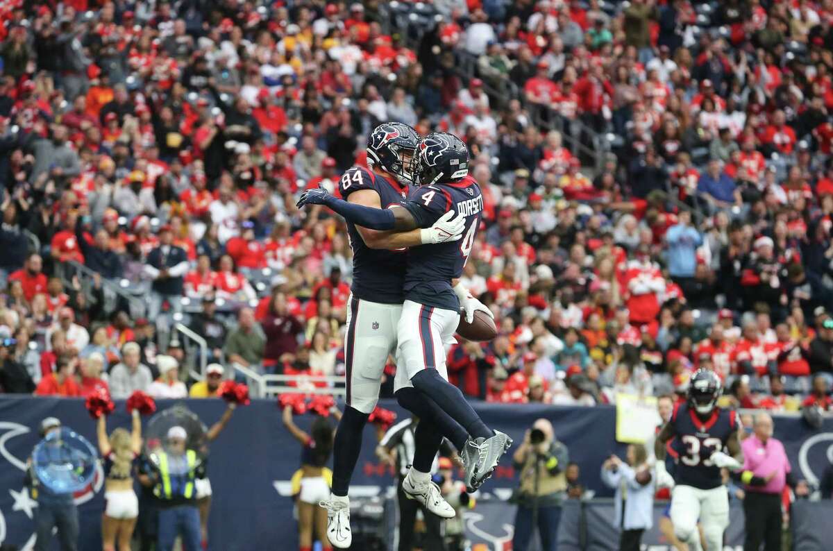 Houston Texans tight end Teagan Quitoriano (84) celebrates his touchdown during the first quarter of an NFL game against the Kansas City Chiefs Sunday, Dec. 18, 2022, at NRG Stadium in Houston.