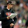 SEATTLE, WASHINGTON - DECEMBER 15: Head coach Kyle Shanahan of the San Francisco 49ers looks on against the Seattle Seahawks during the second quarter at Lumen Field on December 15, 2022 in Seattle, Washington. (Photo by Steph Chambers/Getty Images)