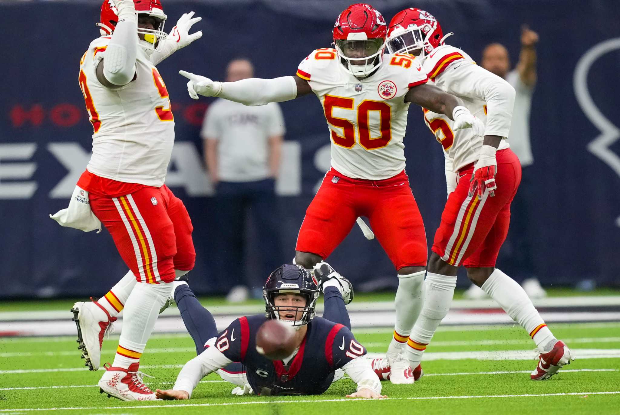 Kansas City Chiefs wide receiver Justin Watson (84) celebrates his  touchdown catch with teammate Jerick McKinnon (