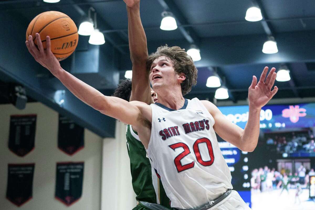 Aiden Mahaney of St. Mary’s looks for two points in the first half against the visiting Colorado State Rams in Moraga, California, on Sunday, December 18, 2022. The score was tied 30-30 at the end of the first half.