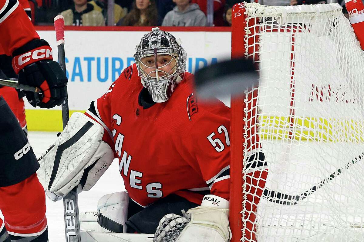 Carolina goaltender Pyotr Kochetkov follows the flight of the puck during the third period of the Hurricanes’ victory over the Penguins.