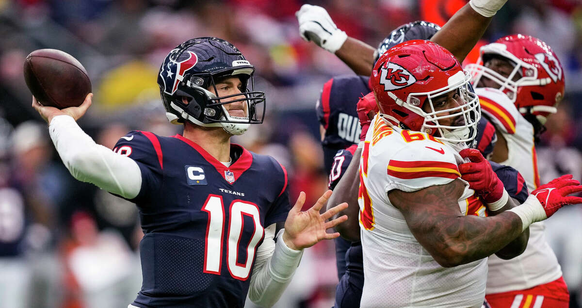 Houston Texans quarterback Davis Mills (10) throws a pass against the Kansas City Chiefs during the second half an NFL football game Sunday, Dec. 18, 2022, in Houston.