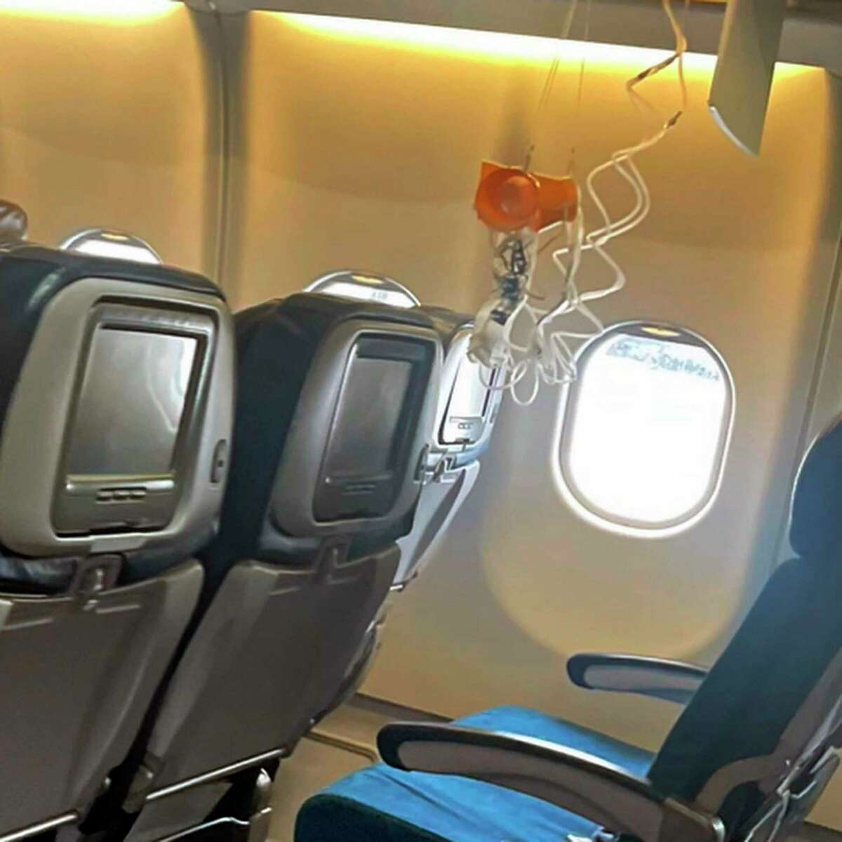 This photo taken by a passenger shows the interior of a Hawaiian Airlines jet on its flight from Phoenix to Honolulu on Sunday after severe turbulence rocked the flight.