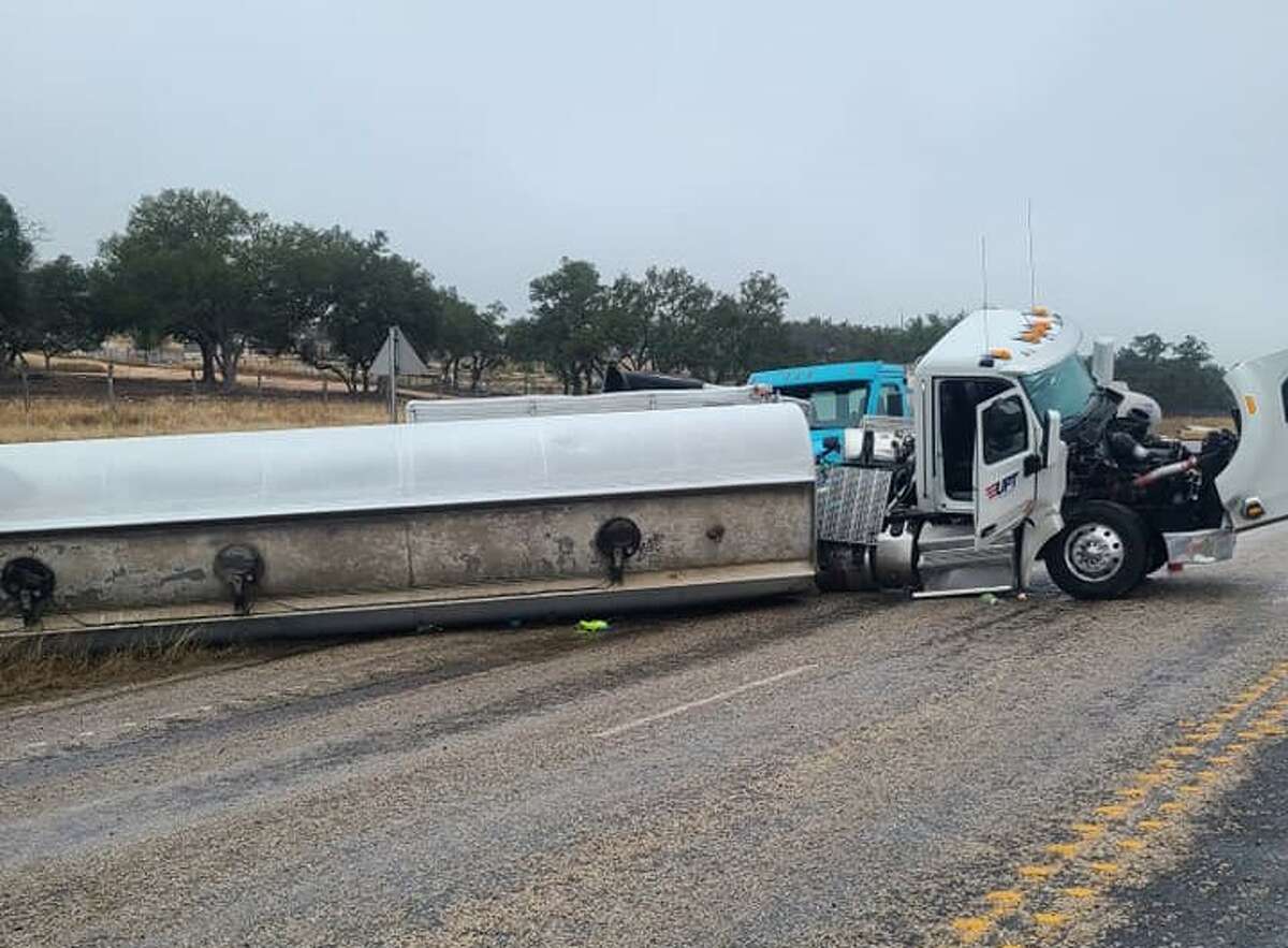 An overturned fuel truck spilled hundreds of gallons of fuel on Highway 87 this morning.